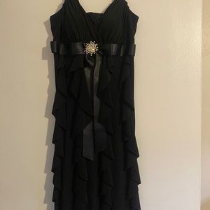 Women’s black dress.